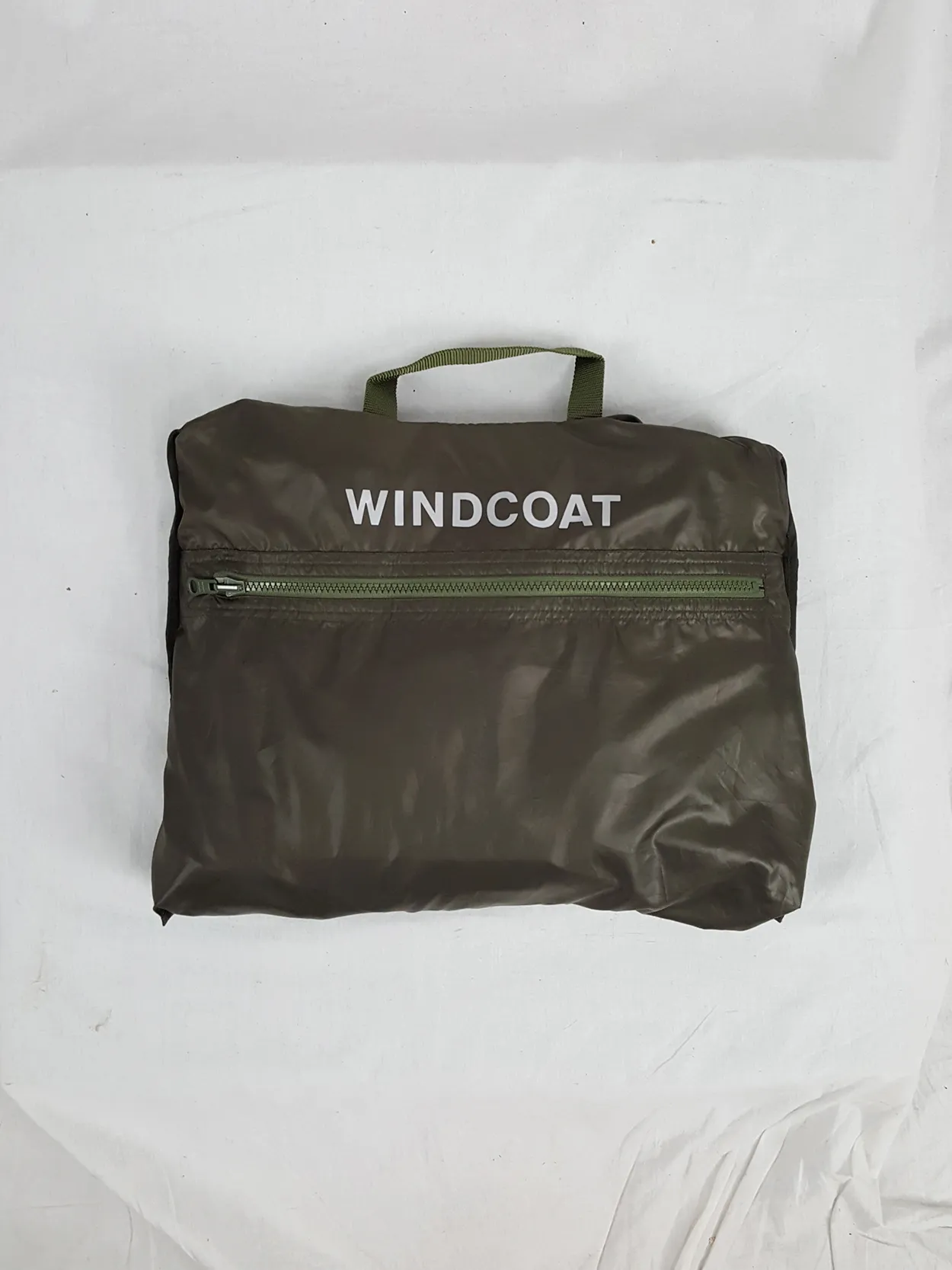 Issey Miyake Windcoat khaki oversized parka that folds into a bag — 1990s